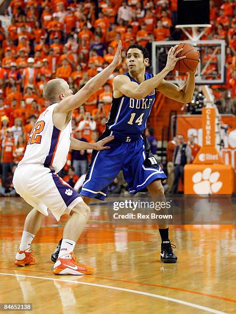 Terrence Oglesby of the Clemson Tigers guards David McClure of the Duke Blue Devils during the first half at Littlejohn Coliseum on February 4, 2009...
