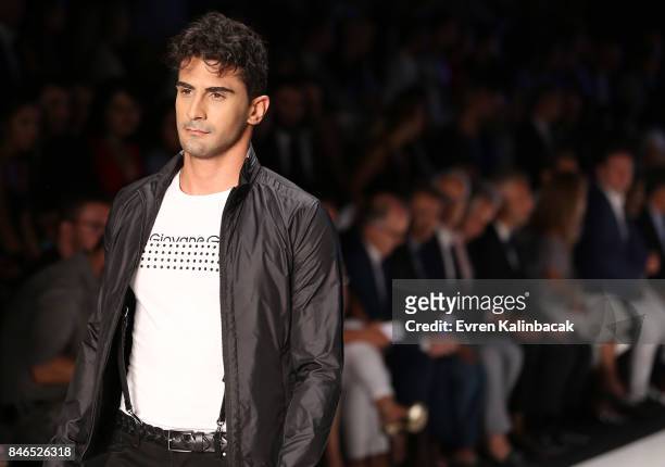 Model walks the runway at the Giovane Gentile show during Mercedes-Benz Istanbul Fashion Week September 2017 at Zorlu Center on September 13, 2017 in...