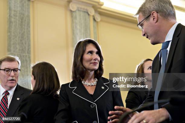 Deborah Hersman, president and chief executive officer of the National Safety Council, center, talks to Chris Spear, president and chief executive...