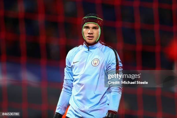 Ederson of Manchester City looks on prior to the UEFA Champions League group F match between Feyenoord and Manchester City at Feijenoord Stadion on...