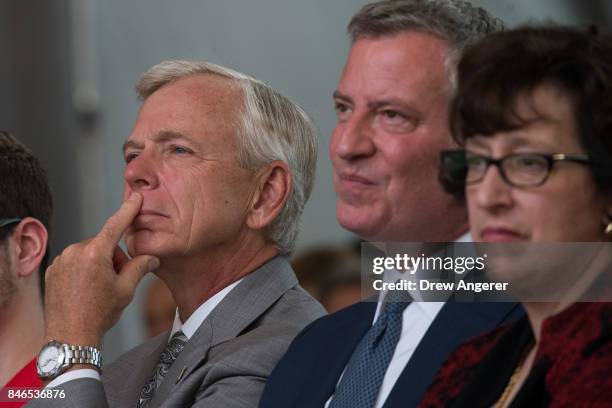 Lowell McAdam, chief executive officer of Verizon Communications, New York City Mayor Bill de Blasio, and Martha Pollack, president of Cornell...