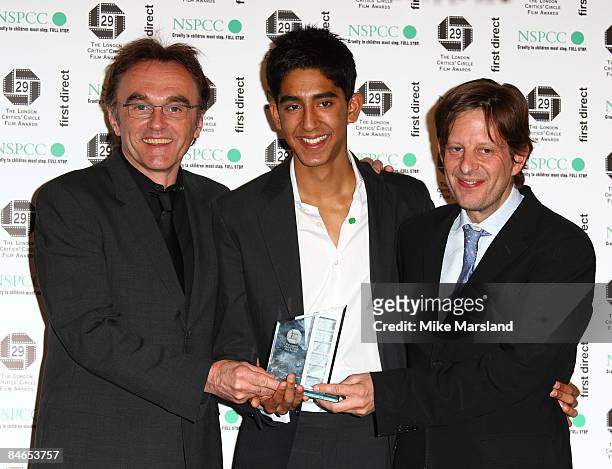 Danny Boyle, Dev Patel and Christian Coulson hold the The Attenborough Award for British Film of the Year at The 29th Annual London Critics' Circle...