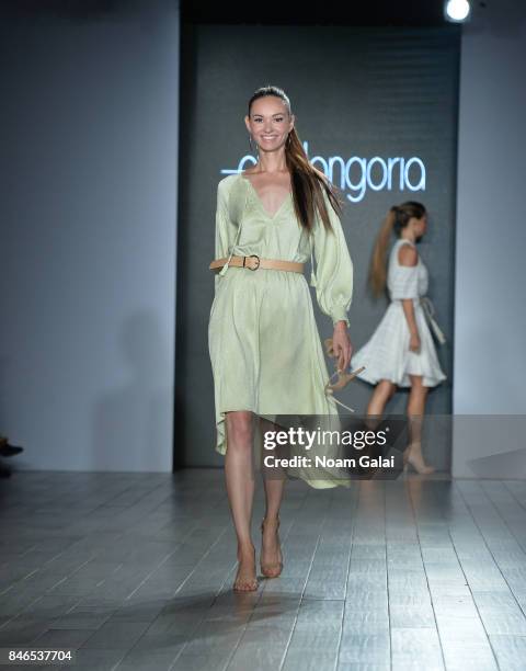 Model walks the runway at the Eva Longoria Collection fashion show during New York Fashion Week: Style360 at Metropolitan West on September 13, 2017...