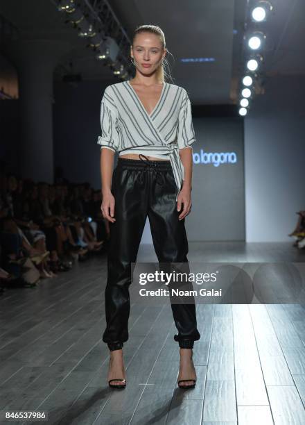 Model walks the runway at the Eva Longoria Collection fashion show during New York Fashion Week: Style360 at Metropolitan West on September 13, 2017...