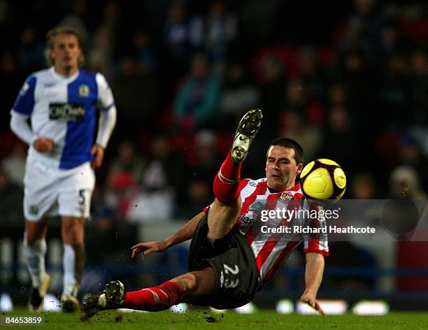 David Healy of Sunderland slips up as he tries to shoot at goal during the FA Cup sponsored by E.ON 4th Round Replay match between Blackburn Rovers...