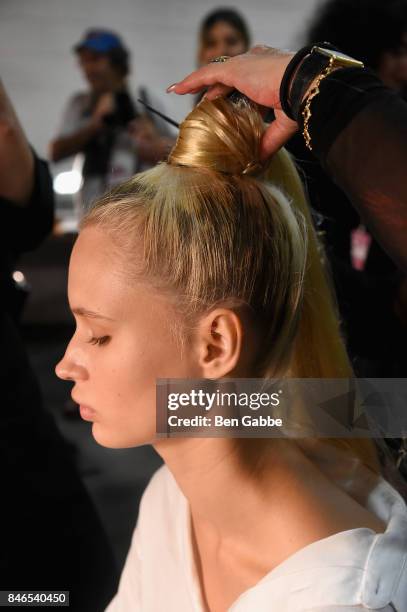 Model prepares backstage for the Zang Toi fashion show during New York Fashion Week: The Shows at Gallery 3, Skylight Clarkson Sq on September 13,...