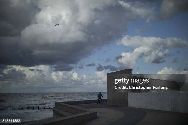 As the summer holiday season comes to a close storm clouds gather over the sea and Rhyl promenade on September 13, 2017 in Rhyl, Wales.