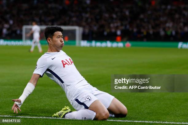 Tottenham Hotspur's South Korean striker Son Heung-Min celebrates after scoring the opening goal of the UEFA Champions League Group H football match...