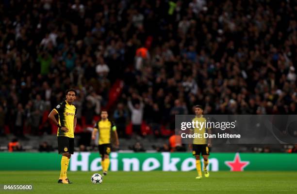 Pierre-Emerick Aubameyang of Borussia Dortmund reacts to Tottenham Hotspur scoring their sides first goal during the UEFA Champions League group H...