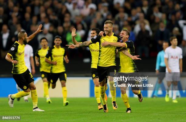 Andrey Yarmolenko of Borussia Dortmund celebrates scoring his sides first goal with his Borussia Dortmund team mates during the UEFA Champions League...