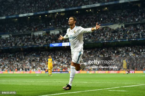 Cristiano Ronaldo of Real Madrid celebrates scoring his sides first goal during the UEFA Champions League group H match between Real Madrid and APOEL...