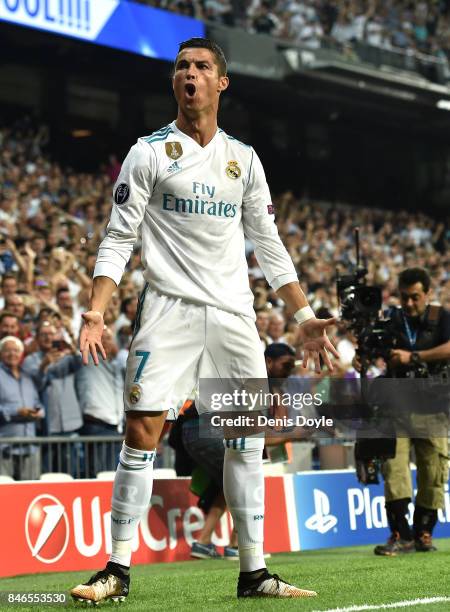 Cristiano Ronaldo of Real Madrid celebrates scoring his sides first goal during the UEFA Champions League group H match between Real Madrid and APOEL...