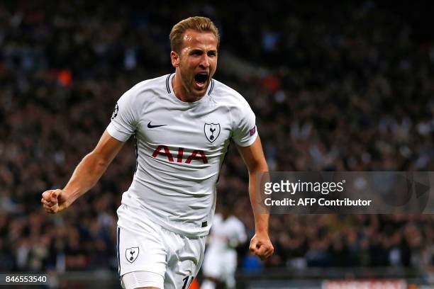 Tottenham Hotspur's English striker Harry Kane celebrates after scoring their second goal during the UEFA Champions League Group H football match...