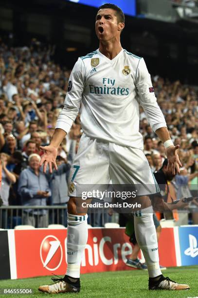 Cristiano Ronaldo of Real Madrid celebrates scoring his sides first goal during the UEFA Champions League group H match between Real Madrid and APOEL...