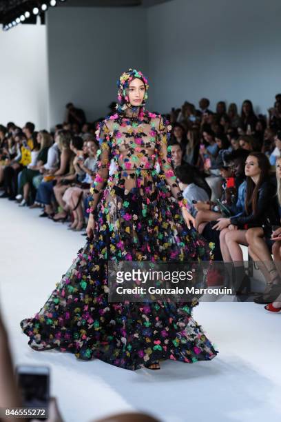 Alexandra Agoston walks the runway at the Christian Siriano fashion show during New York Fashion Week: The Shows at Pier 59 on September 9, 2017 in...