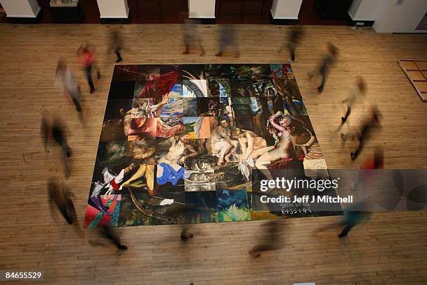 Edinburgh art college students, walk around a large-scale reproduction of Titian�s masterpiece Diana and Actaeon on February 5, 2009 in Edinburgh,...