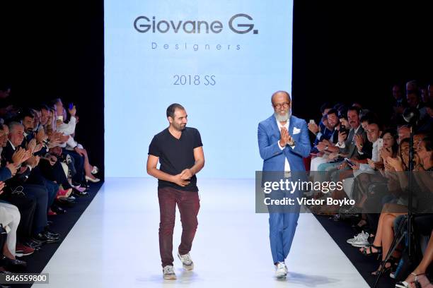 Fikri Temel and Tulug Ozgur are applauded on the runway at the Giovane Gentile show during Mercedes-Benz Istanbul Fashion Week September 2017 at...