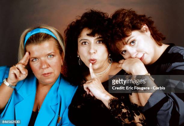 French comic actresses Mimie Mathy, Isabelle de Botton and Michele Bernier, known as 'Les Filles' poses during a portrait session in Paris, France on...