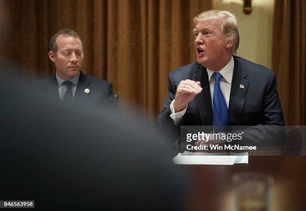 President Donald Trump meets with Democratic and Republican members of Congress, including Rep. Josh Gottheimer , in the Cabinet Room of the White...