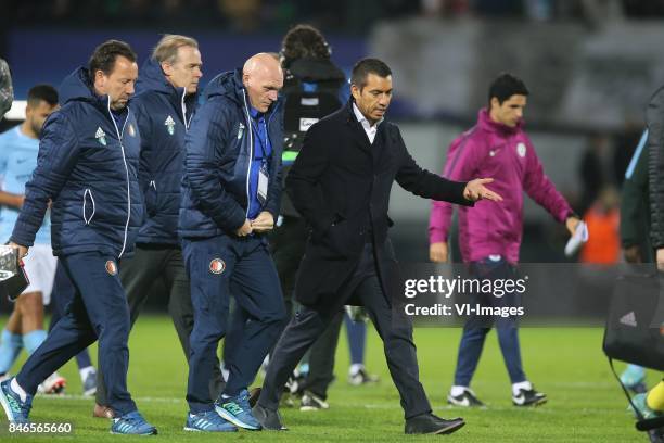 Assistant trainer Jean-Paul van Gastel of Feyenoord, assistant trainer Jan Wouters of Feyenoord, coach Giovanni van Bronckhorst during the UEFA...
