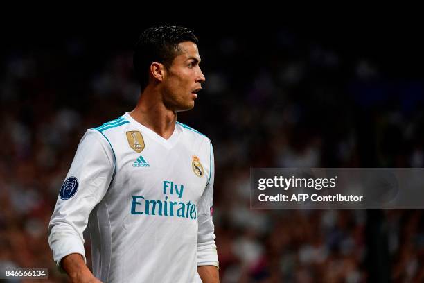 Real Madrid's forward from Portugal Cristiano Ronaldo looks on during the UEFA Champions League football match Real Madrid CF vs APOEL FC at the...