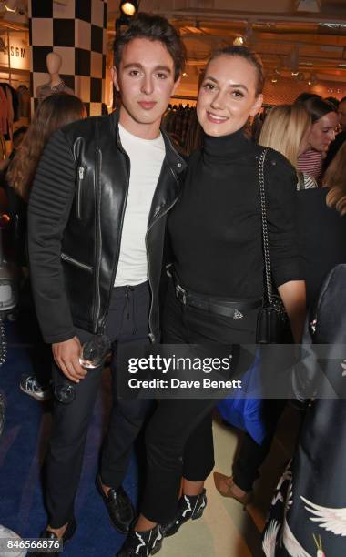 Lucas Andrei and Andreea Cristea attend the launch of the House of Holland x Woody Woodpecker London Fashion Week pop up at Fenwick Of Bond Street on...