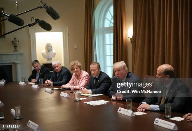 President Donald Trump meets with Democratic and Republican members of Congress in the Cabinet Room of the White House September 13, 2017 in...