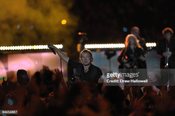 February 1: Musician Bruce Springsteen and the E Street Band perform at the Bridgestone halftime show during Super Bowl XLIII between the Arizona...