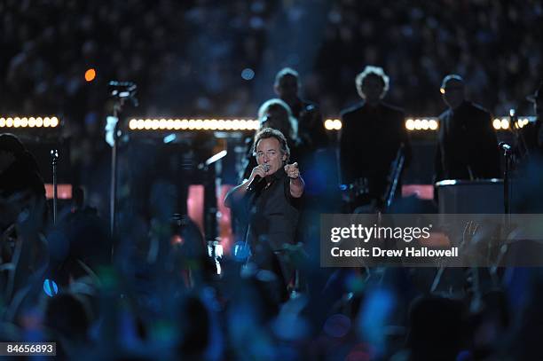 February 1: Musician Bruce Springsteen and the E Street Band perform at the Bridgestone halftime show during Super Bowl XLIII between the Arizona...