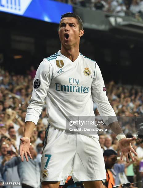 Cristiano Ronaldo of Real Madrid celebrates scoring his sides first goal during the UEFA Champions League group H match between Real Madrid and APOEL...