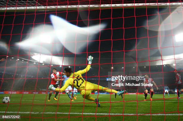 John Stones of Manchester City scores his sides first goal during the UEFA Champions League group F match between Feyenoord and Manchester City at...