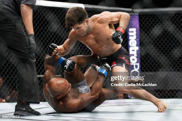 Henry Cejudo, top, fights Wilson Reis during UFC 215 at Rogers Place on September 9, 2017 in Edmonton, Canada.