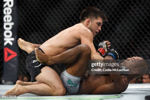 Henry Cejudo, top, fights Wilson Reis during UFC 215 at Rogers Place on September 9, 2017 in Edmonton, Canada.