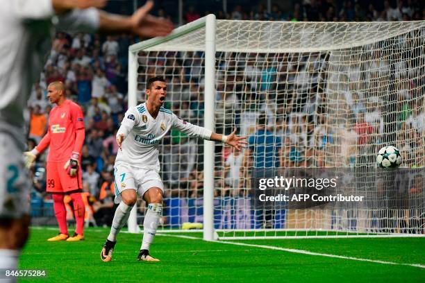 Real Madrid's forward from Portugal Cristiano Ronaldo argues after his goal was cancelled during the UEFA Champions League football match Real Madrid...