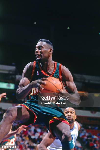 Shawn Kemp of the Seatte SuperSonics rebounds against the Minnesota Timberwolves circa 1996 at the Target Center in Minneapolis, Minnesota. NOTE TO...