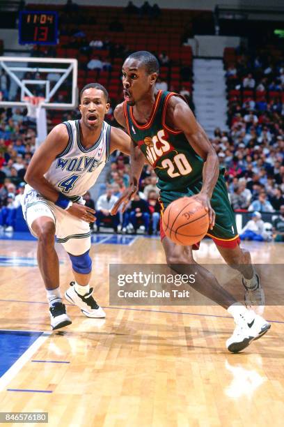 Gary Payton of the Seattle SuperSonics drives against the Minnesota Timberwolves circa 1996 at the Target Center in Minneapolis, Minnesota. NOTE TO...