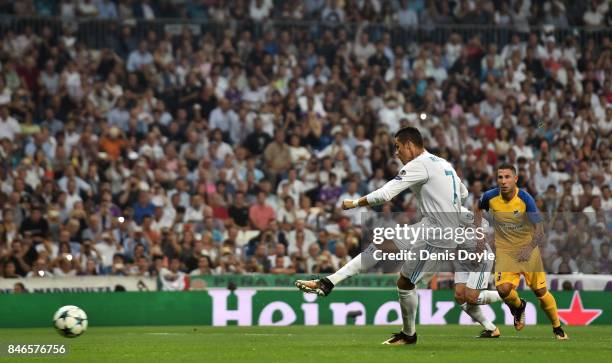Cristiano Ronaldo of Real Madrid scores his sides second goal during the UEFA Champions League group H match between Real Madrid and APOEL Nikosia at...