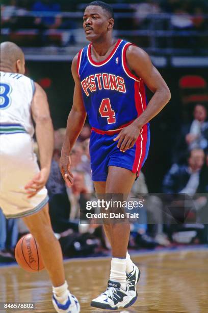 Joe Dumars of the Detroit Pistons dribbles against the Minnesota Timberwolves circa 1994 at the Target Center in Minneapolis, Minnesota. NOTE TO...