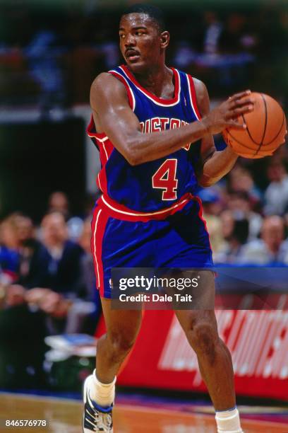 Joe Dumars of the Detroit Pistons dribbles against the Minnesota Timberwolves circa 1994 at the Target Center in Minneapolis, Minnesota. NOTE TO...