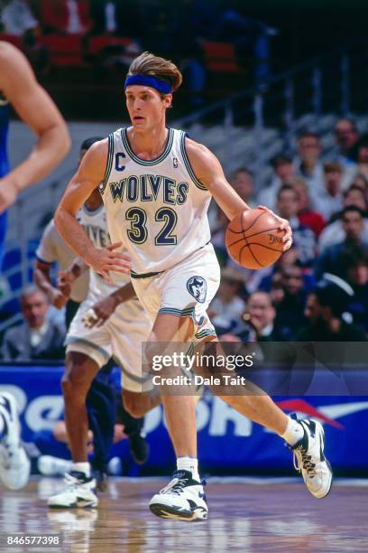 Christian Laettner of the Minnesota Timberwolves dribbles against the Dallas Mavericks circa 1994 at the Target Center in Minneapolis, Minnesota....