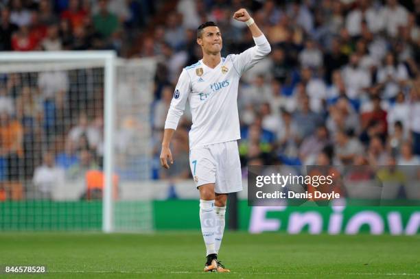 Cristiano Ronaldo of Real Madrid celebrates scoring his sides second goal during the UEFA Champions League group H match between Real Madrid and...