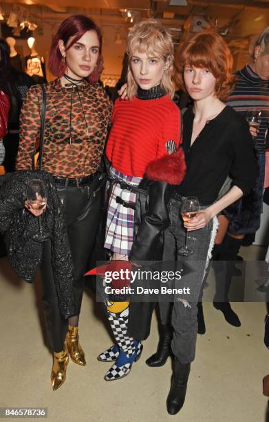 Nikita Andrianova, Charlie Barker and Edwina Preston attend the launch of the House of Holland x Woody Woodpecker London Fashion Week pop up at...