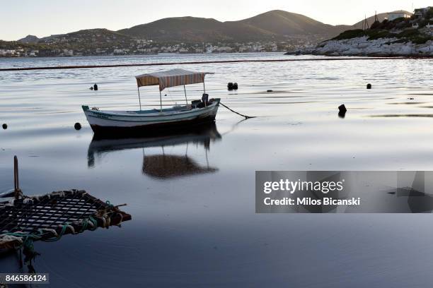 Boat floats on polluted water on the coast of Salamis Island on September 13, 2017 in Salamis, Greece. The small tanker 'Agia Zoni II' sank on...