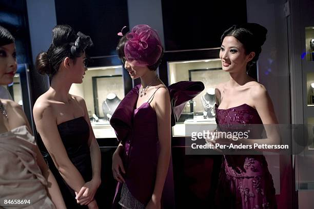 Models pose with jewelry at the annual Millionaires Fair on October 10, 2008 in Shanghai, China. About fifty exhibitors show their luxury goods such...