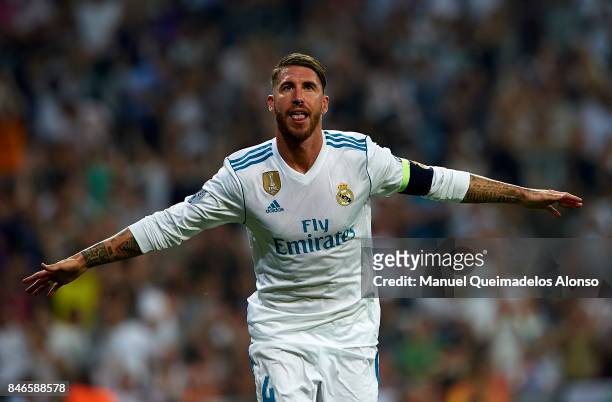 Sergio Ramos of Real Madrid celebrates scoring his team's third goal during the UEFA Champions League group H match between Real Madrid and APOEL...