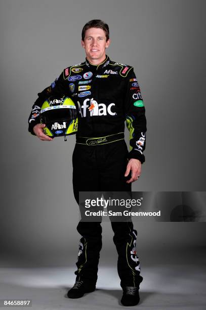 Carl Edwards, driver of the Aflac Ford, poses during NASCAR media day at Daytona International Speedway on February 5, 2009 in Daytona, Florida.