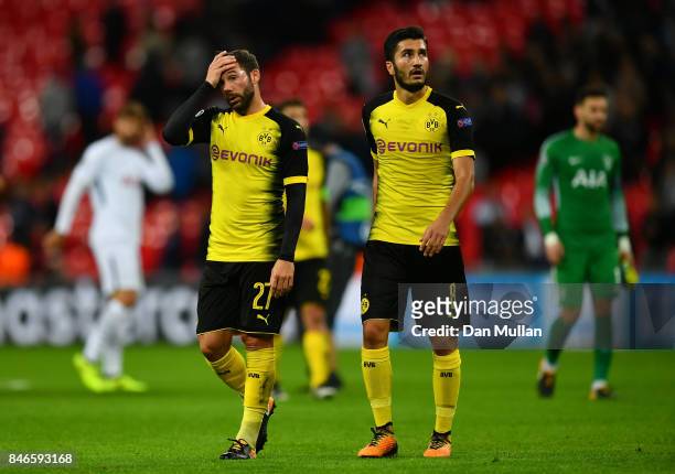 Gonzalo Castro of Borussia Dortmund and Nuri Sahin of Borussia Dortmund look dejected after the UEFA Champions League group H match between Tottenham...