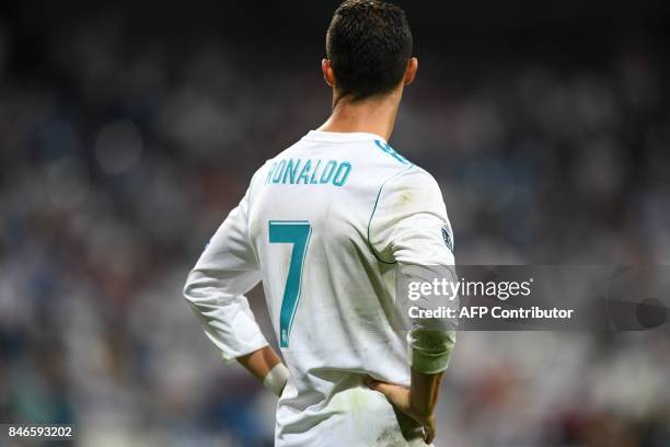 Real Madrid's forward from Portugal Cristiano Ronaldo looks on after the UEFA Champions League football match Real Madrid CF vs APOEL FC at the...