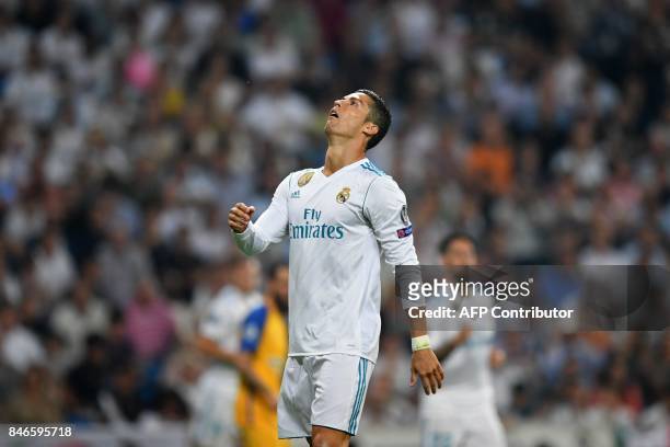Real Madrid's forward from Portugal Cristiano Ronaldo gestures during the UEFA Champions League football match Real Madrid CF vs APOEL FC at the...
