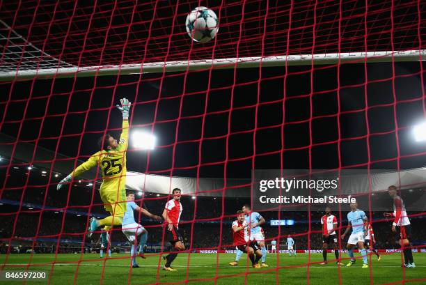 John Stones of Manchester City scores their fourth goal past goalkeeper Brad Jones of Feyenoord during the UEFA Champions League group F match...